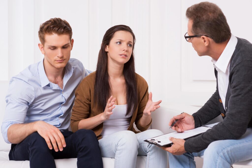 couple getting bailiff debt advice from bailiff advisor.